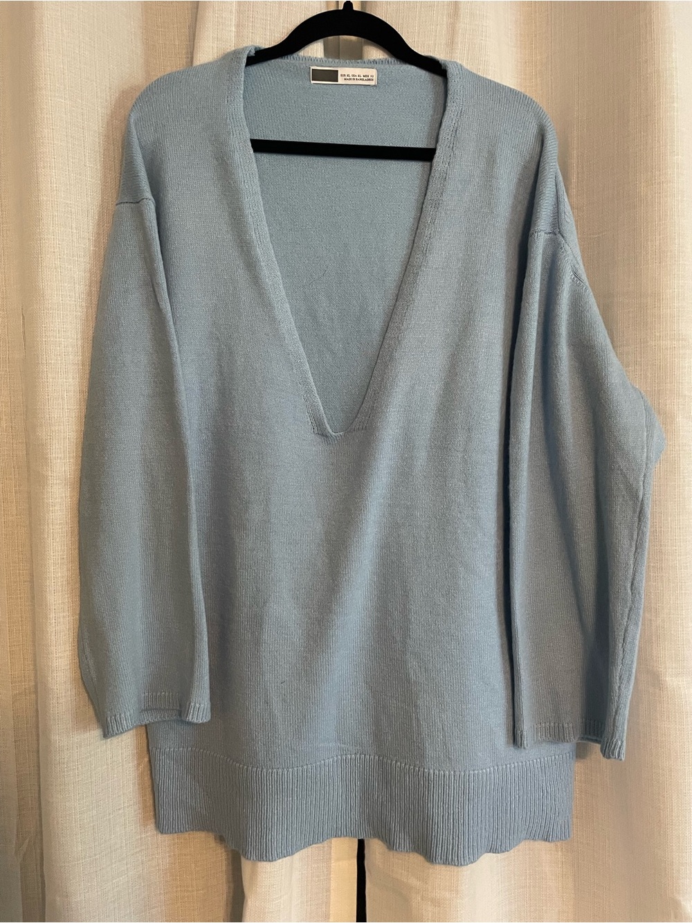 Relaxed Deep V-Neck Women's Sweater in Light Blue